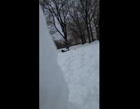 Woman yells to girl crawl snow park