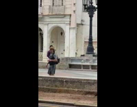 white pants art graffiti wall black lamp