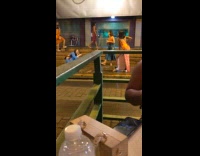 Woman in blue dress shouts for her friend