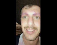 Guy haircut beautiful brown eyes glitter eyebrows