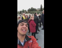 Guy talk disturb old people  on bridge