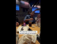 Waitress takes away man food while eating