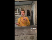 Yellow guess sweater guy bathroom mirror raid 