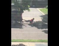 Amazon driver does push ups by truck 