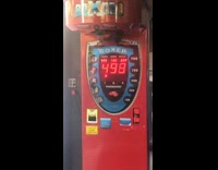 Guy breaks arcade punching bag machine