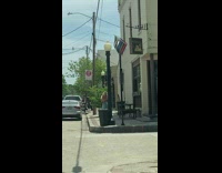 Woman in tube top tiktok dance on the sidewalk Part 1