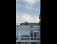Men training for boxing on rooftop