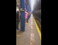Guy does tricks withy yoyo at station 