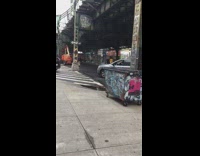 Powerlines broken under train tracks car pass by