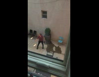 Guy practicing his firebending by juggling fire sticks