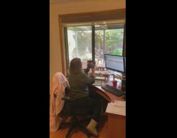 Woman home quarantine office film pet outside