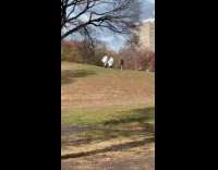 Couple wearing ghosts costumes doing photoshoot 