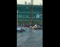 Yacht flipped over river surrounded by NYPD