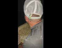 Woman fishing catches husbands scalp 