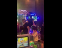 Guy black shirt play step mania DDR