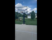 Shirtless guy jumps loses shoes and shoots basketball 