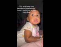 Baby gives mom a look for recording her 