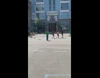 Group of dancers in neon colors perform for video 