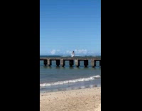 Woman run on the pier for video
