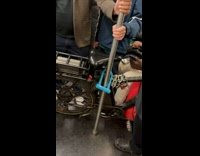 Collab Subway Creatures - Bike locked to subway train pole nyc