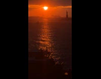 Submitter films orange sunset over river view