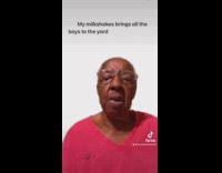 Granddaughter tries to get grandma to sing lyrics 