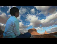 Guy goes on virtual vacation white remote 