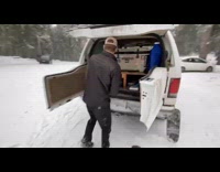 Guy uses surfboard as sled and snowboard 