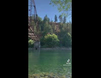 Man Jumps on Ledge to Dive in River