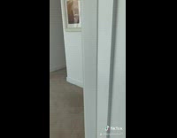 House tour bathroom has giant screen