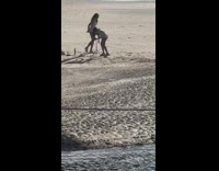 Twins white shorts bend knee pose beach