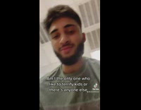 Guy chases toddler at laundromat and makes weird noises at him 
