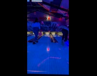 Guy bowls ball onto next lane and gets gutter