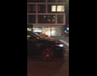 Person blocks moving cars