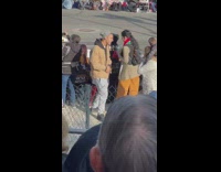 Man raps by the Rose Parade taken by his family