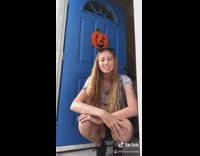 Girl opens door turtle pumpkin halloween costume