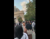 Shirtless guy green hat diaper raps park