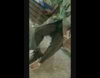 Man camouflage pants and open top shoes with lace