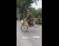 Man on vintage bike levitates in the air 