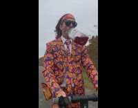 Guy rides scooter cranberry juice falls off 