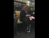 woman has pink rollers on hair