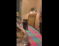 Guy blue shirt feet on chair table