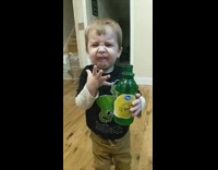 Little boy reacts to drinking lemon juice 
