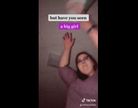 Girl pours empty bag jumps on camera