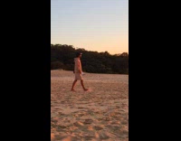 Woman yoga pose at the sand hill