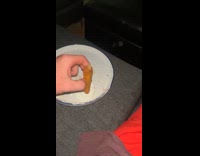 Man tapping taquito steam rings blows out