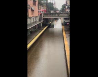 Railway tracks at train station is flooded