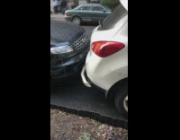 Parked SUV with metal guards on bumpers 