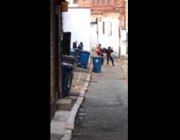Woman in white sweater and pants alley picture