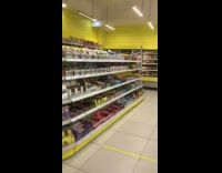 Guy sees pigeon bird in market store 